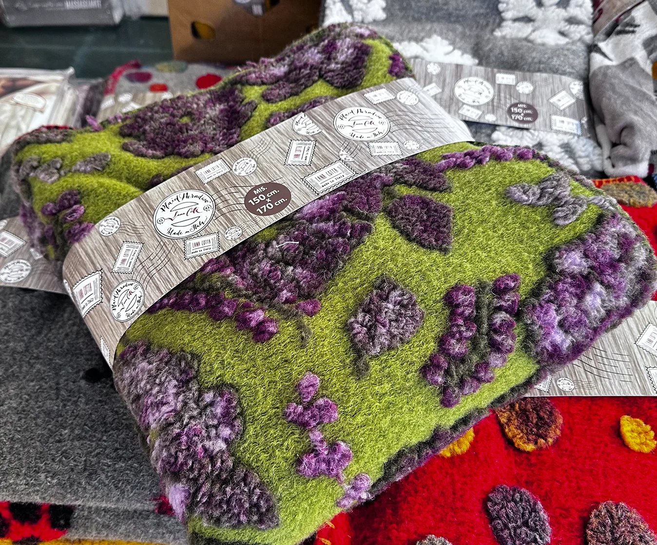 plaid lanacotta verde con motivo floreale